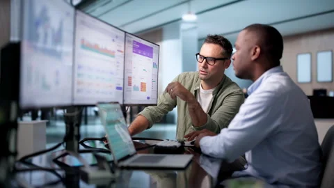Treasury Manager And Analyst Review Real-time Cash Flow Stock Footage 345850510