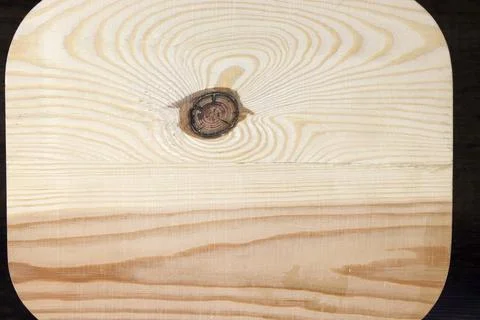 Treated pine board with a clearly visible structure and grain of the wood. Stock Photos