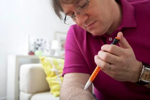 Treating diabetes in a man Stock Photos