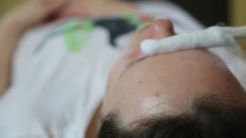 Treatment and massage of the face using liquid nitrogen Stock Footage 83335491