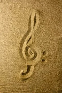 Treble clef Written in the Sand Stock Photos