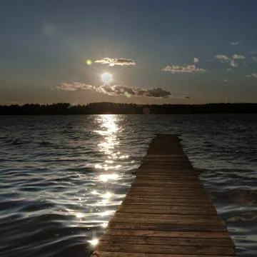 Tree berth of boards during sunset- the concept of relaxation-water sports-en Stock-Fotos