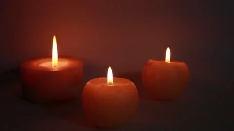 Tree burning candles in the dark 스톡 동영상 146042477