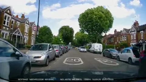 Tree collapses nearly causing carnage in West London Stock-Footage 134545107