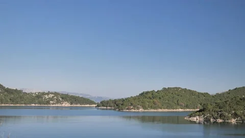 Tree covert coast and tiny islands in Mediterranean Sea, Croatia Stock Footage 205270731