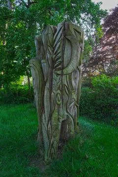 The tree is decorated with intricate patterns on the bark Stock Photos