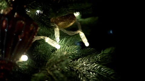 Tree decorated with sparkly christmas tree toys and shining lights. Stock Footage 121749820