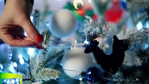 The tree is decorated with a toy in the form of a deer. Stock-Footage 264307656