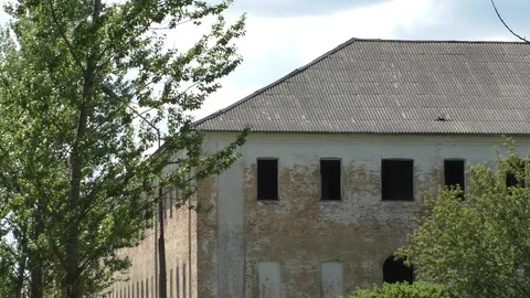 A tree in front of old a house. Old Ruins Stock Footage 130139113