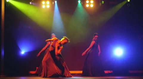 Tree girls dancing on stage Stock Footage 66865387