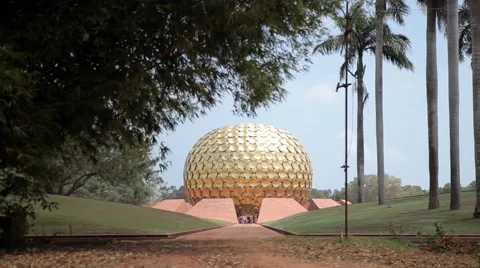 Tree Leaves moving &amp; people walking in Matri Mandir Auroville Pondicherry Stock Footage 63750045