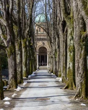 Tree lined path leading to the domed entrance to Mirogoj Cemetery Stock Photos