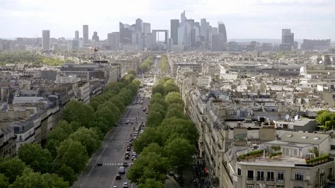 Tree-lined streets skyscrapers in distant skyline - high view - Paris France Stock Footage 93930951