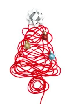 A tree made of red thread and ribbon, ball on white background Stock Photos