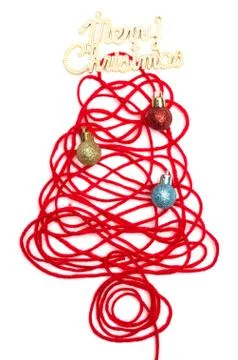 A tree made of red thread and merry christmas text, ball on white background Stock Photos