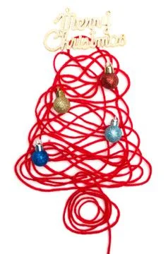A tree made of red thread and merry christmas text, ball on white background Stock Photos