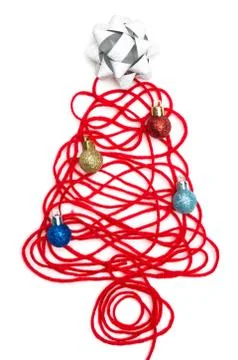 A tree made of red thread and ribbon, ball on white background Stock Photos
