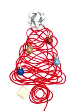 A tree made of red thread and ribbon, ball, small box on white background Stock Photos
