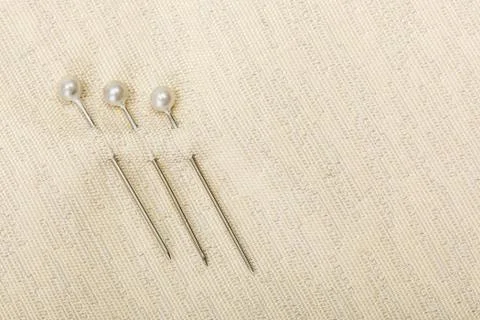 Tree pins inserted in fabric Stock Photos