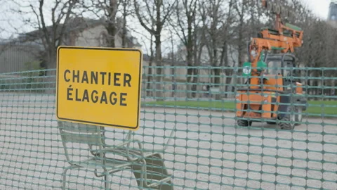 Tree Pruning Work Zone Sign and Equipment in Paris Park Daylight Stock Footage 327356720