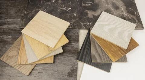 Tree-like samples of MDF laminated material. Concept of furniture and flooring 库存照片
