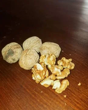 From tree to table the alluring landscape of walnuts, peeled and unpeeled Stock Photos