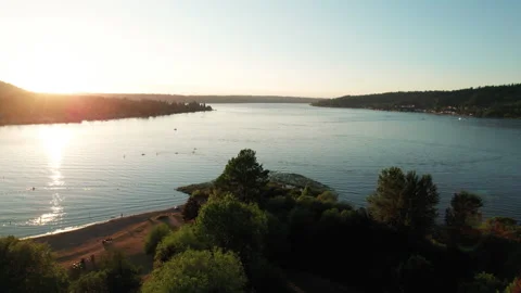 Tree Tops Drone View of Lake Sammamish at Sunset Stock Footage
