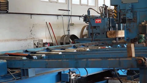 Tree Trunk Being Cut into Planks Machine Details Sawmill Interior Slow motion Stock Footage 128491982