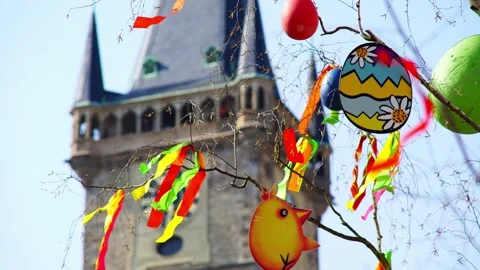 Tree with various Easter decorations of coloured strips Stock Footage 143378515
