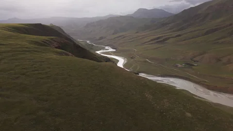 Treeless Mountain Landscape With Flowing River In Kyrgyzstan, Central Asia Stock Footage 322600590