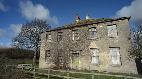 Trees and bushes growing over empty hall near Leeds Yorkshire UK Stock Footage 47326047