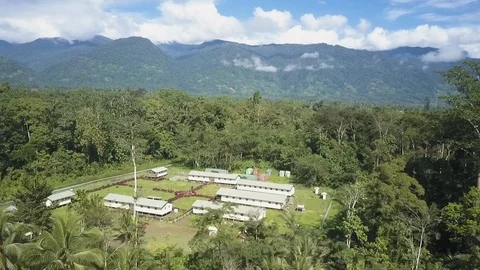 Trees and house view with mountains Stock Footage 86089322