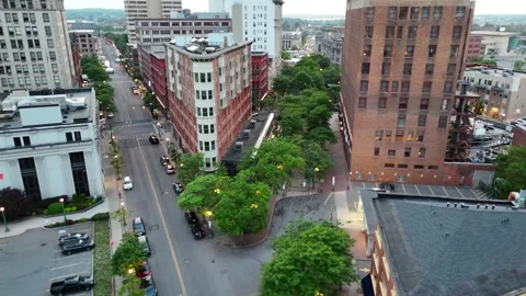 Trees Brush Against the High-Rise Buildings - Syracuse, NY 库存影片 336474060