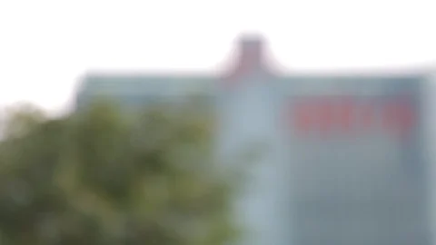 Trees in foreground NTUC background Video stock 90373393