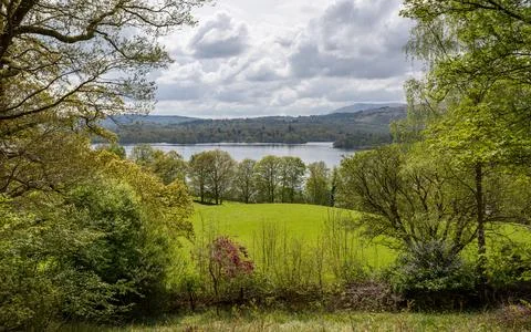 Trees framing Lake Windermere Stock Photos