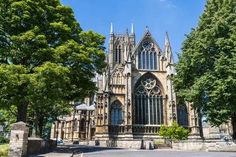 Trees framing Lincoln cathedral Stock Photos