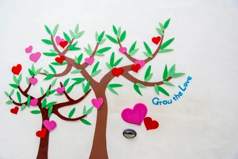 Trees of heart on white wall Stock Photos