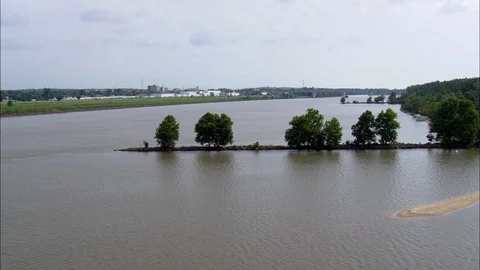 Trees on the mud pier in the vast lake, River through trees on way to Fort Stock Footage 109123255