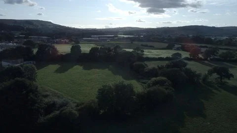 Trees shadows, green fields, sun shining through clouds, Drone, Yorkshire Stock Footage 95326541