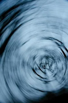 Trees vortex in side sun light, sky background Stock Photos