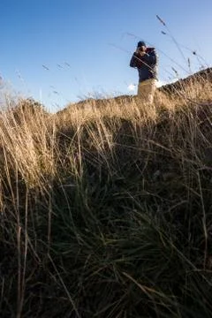 Trekker with camera Stock Photos