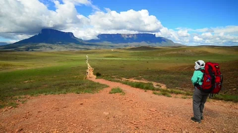 A trekker getting ready for walking on a long trekking route Stock Footage 58630865