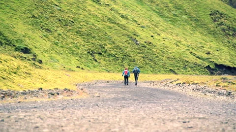Trekkers walk on path Видео 57504310