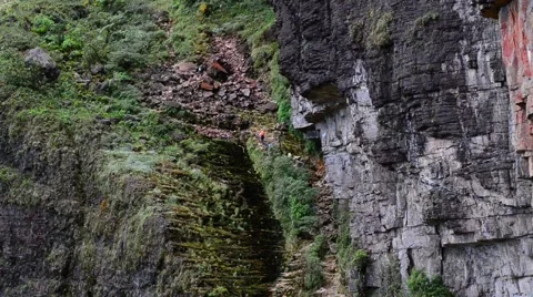 Trekkers walking up the side of Mount Roraima. Stock Footage 58630867