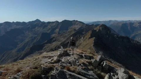 Trekking in the alps mountains Video stock 117629392