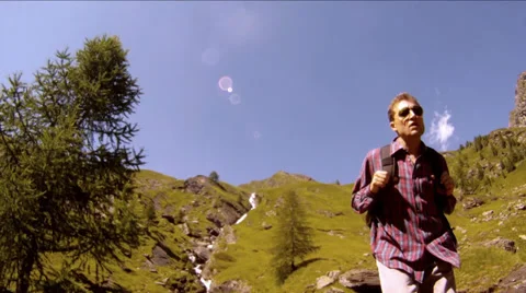 Trekking. Man into the wild. Stock Footage 34464717