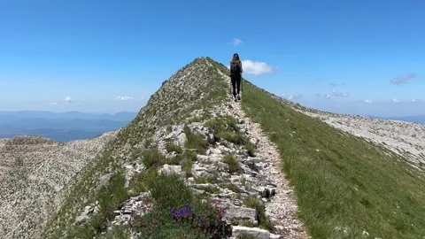 Trekking on the ridges of Mount Redentore during summer Stock Footage 245816081