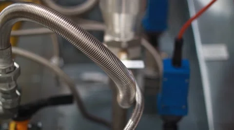 Trembling corrugated pipe on the equipment Stock Footage 48363453