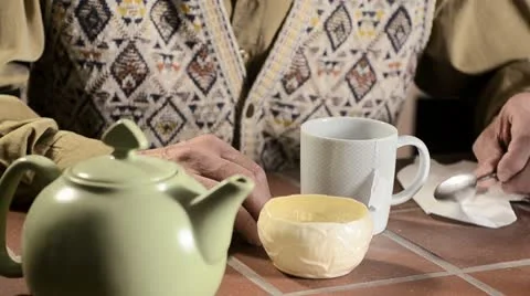 Trembling hands making tea 2 Stock Footage 8949455