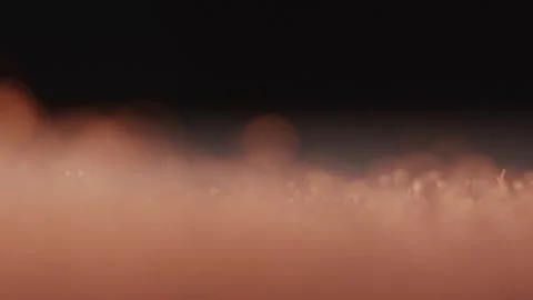 Trembling Loudspeaker Throwing Orange Powder In The Air Stock Footage 253774798